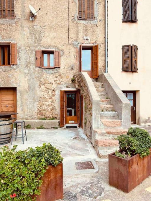Charmant Petit Appartement Place De L Eglise Пяна Екстериор снимка